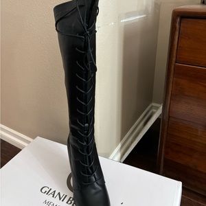Super cute boots never worn , size 9 lace up front